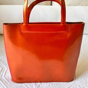 Sleek La Marthe Handbag in orange, classic elegance